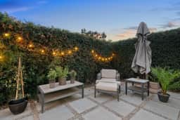 The Palm House by Coastline Vacation Rentals